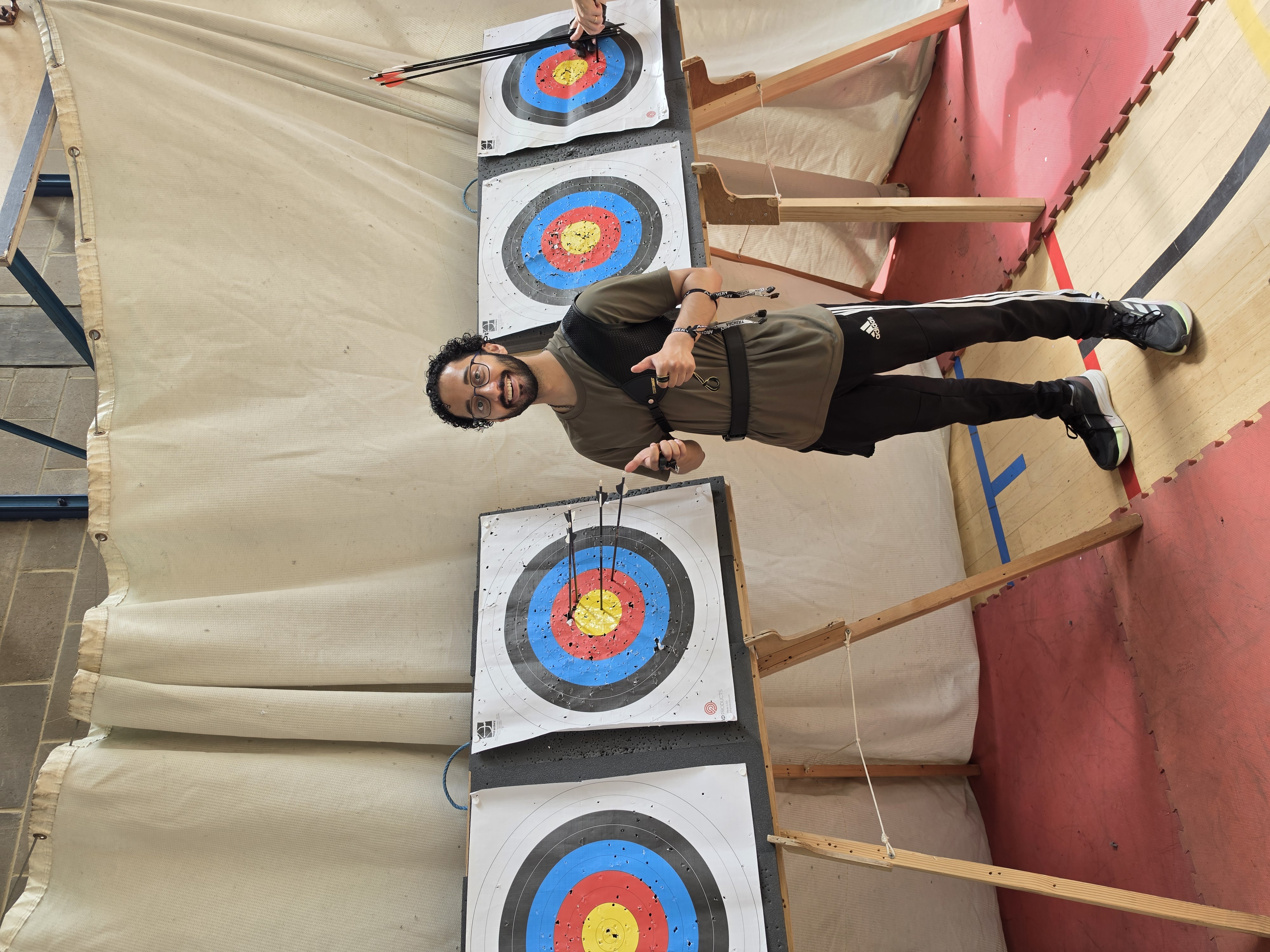 Checking the arrow grouping after an end on the indoor range