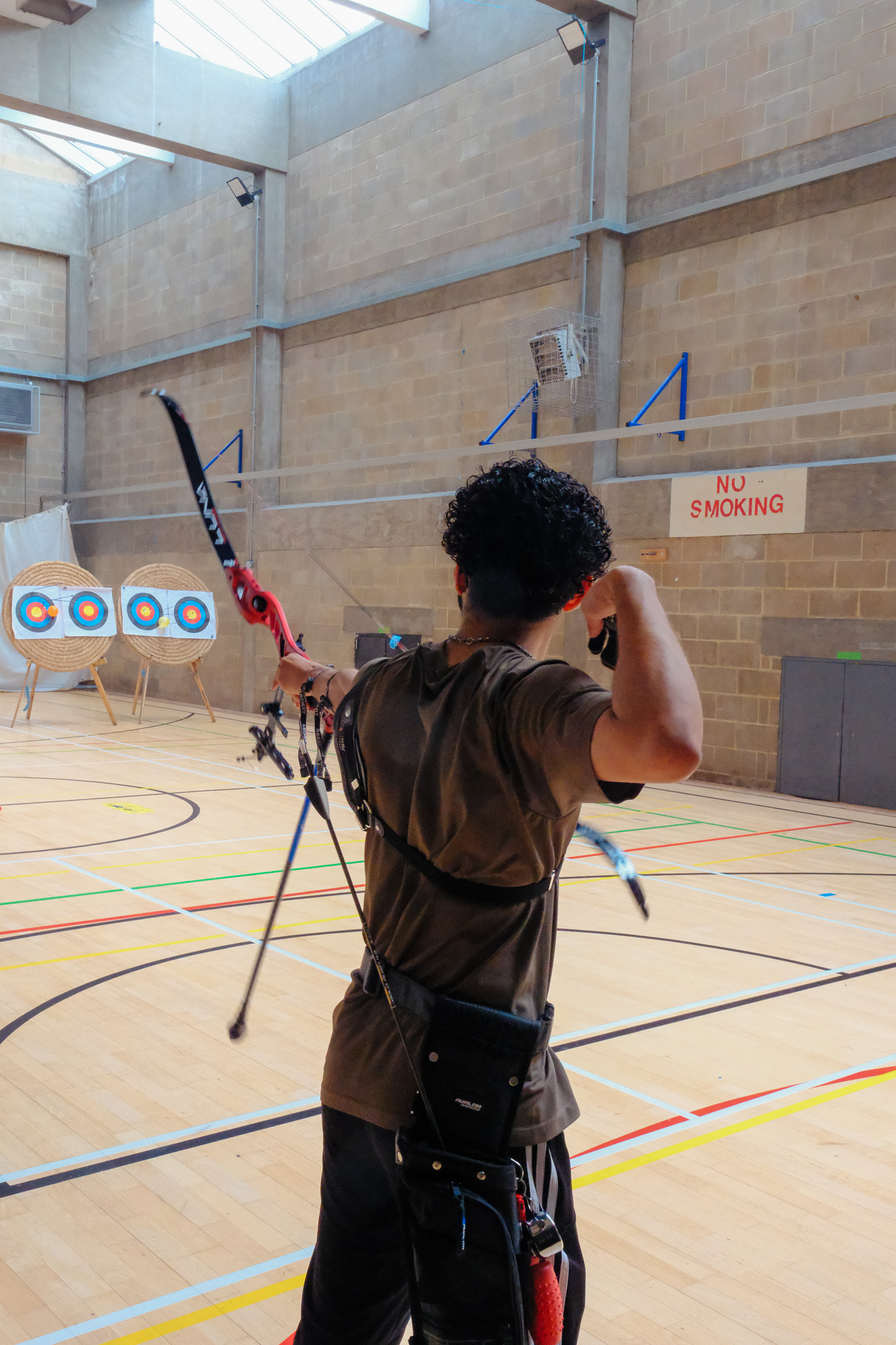 Full draw, indoor range
